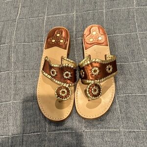 Brown and Gold Jack Roger’s Sandals.